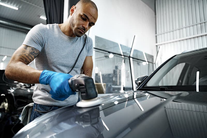 Car Detailing. Male Hands with Orbital Polisher in Auto Repair Shop ...