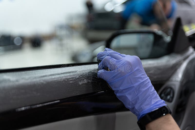 Car Detailing Worker Cleaning Car Interior Doors Stock Image Image of