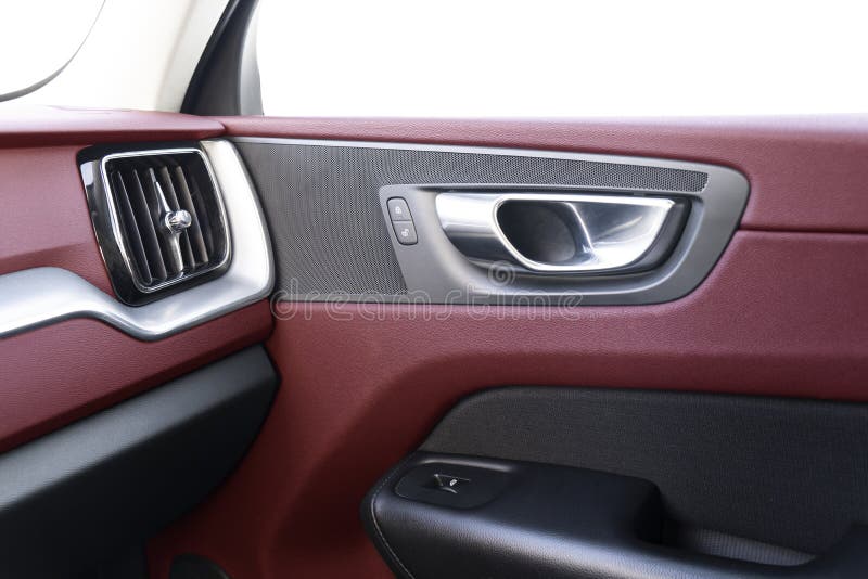 Car Door Handle Inside the Luxury Modern Car with Red Leather Texture