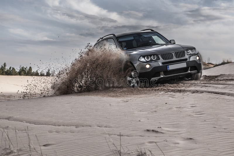 Car Driving through Sand Dune Stock Photo Image of nature, offroad