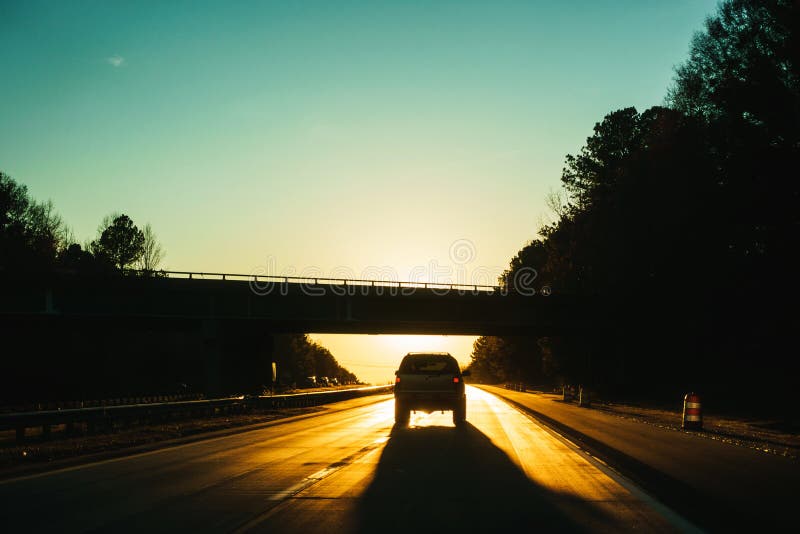 Driving during Sunset Blurred Background Stock Image Image of black