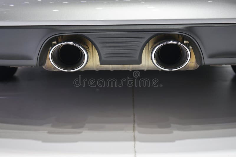 Car dual exhaust pipe. stock photo. Image of detail, greenhouse 83909818