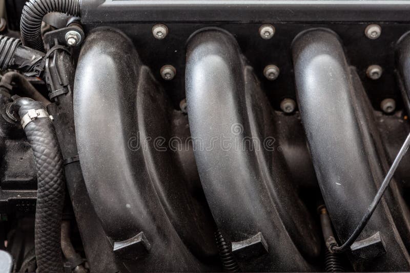 Car Engine Black Plastic Cover. Stock Photo Image of close, closeup
