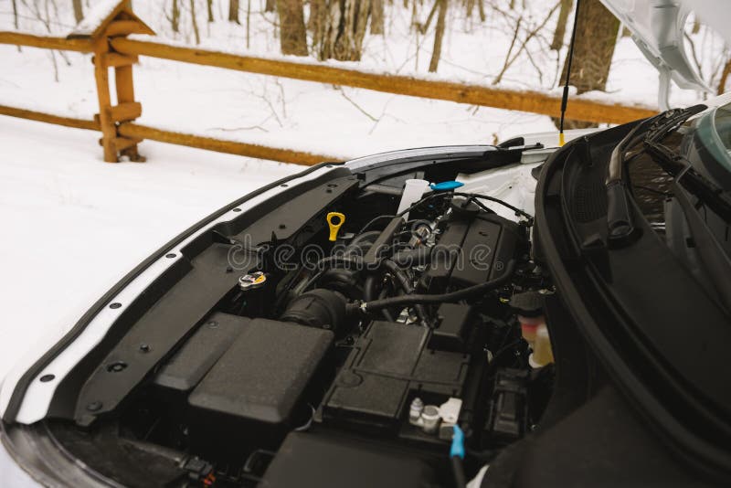 Car engine closeup with copy space. Outdoor photo in winter royalty free stock images