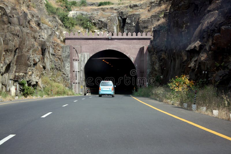 Car Entering a Tunnel stock photo. Image of rocky, fast 8888088