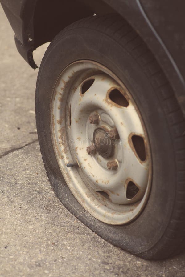 Car flat tire stock image. Image of repair, puncture 83483883