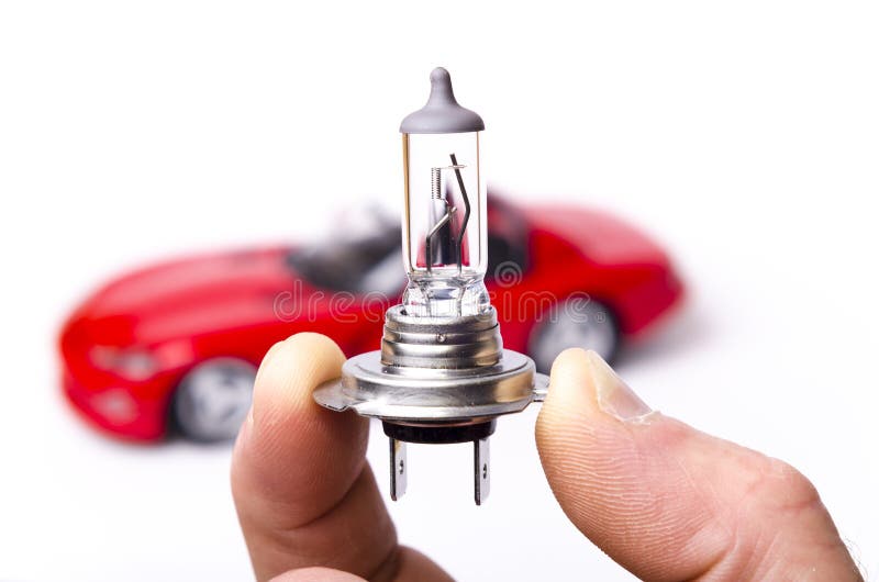 Car halogen light bulb and red car