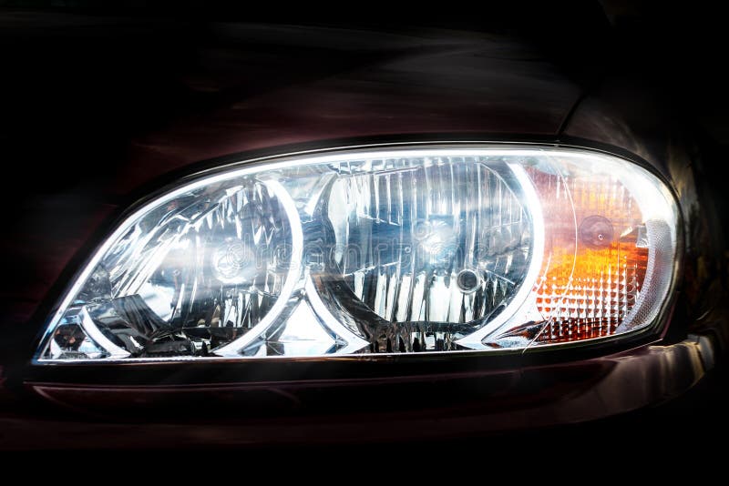 Car Headlight Head Light Closeup Front View, Illuminated Stock Photo