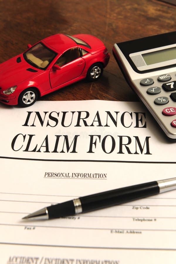 Car insurance claim form on desk