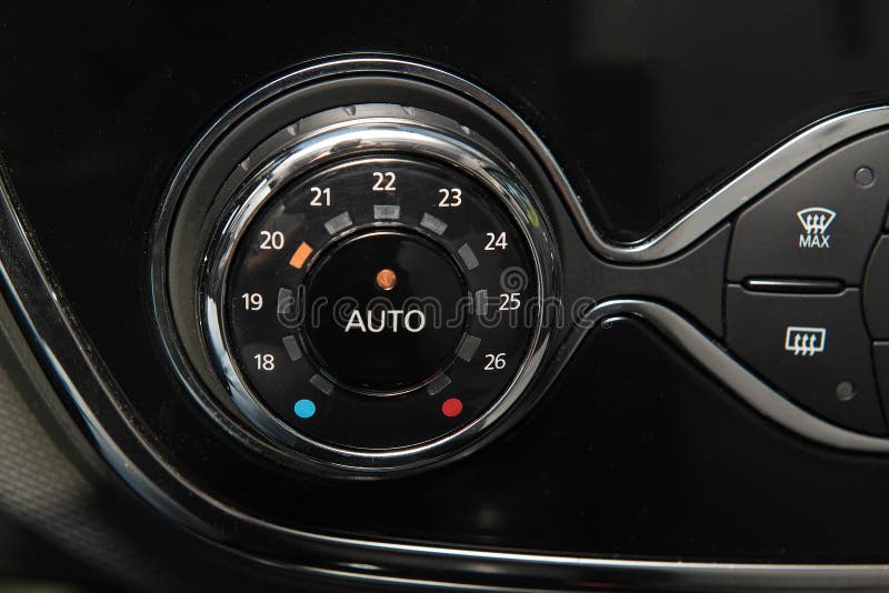 Car Interior with Closeup of Air Conditioning System Control Switch