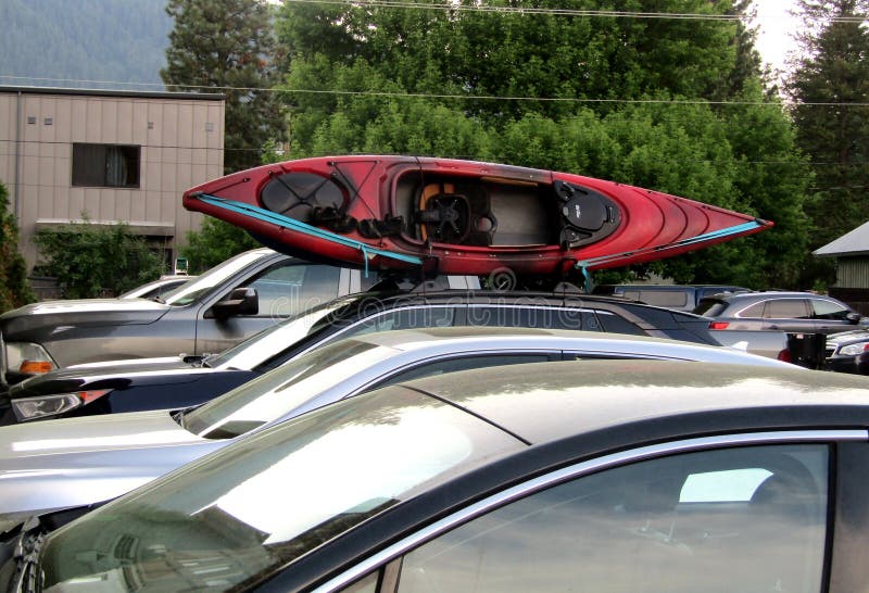 Car with kayak canoe on top. royalty free stock images