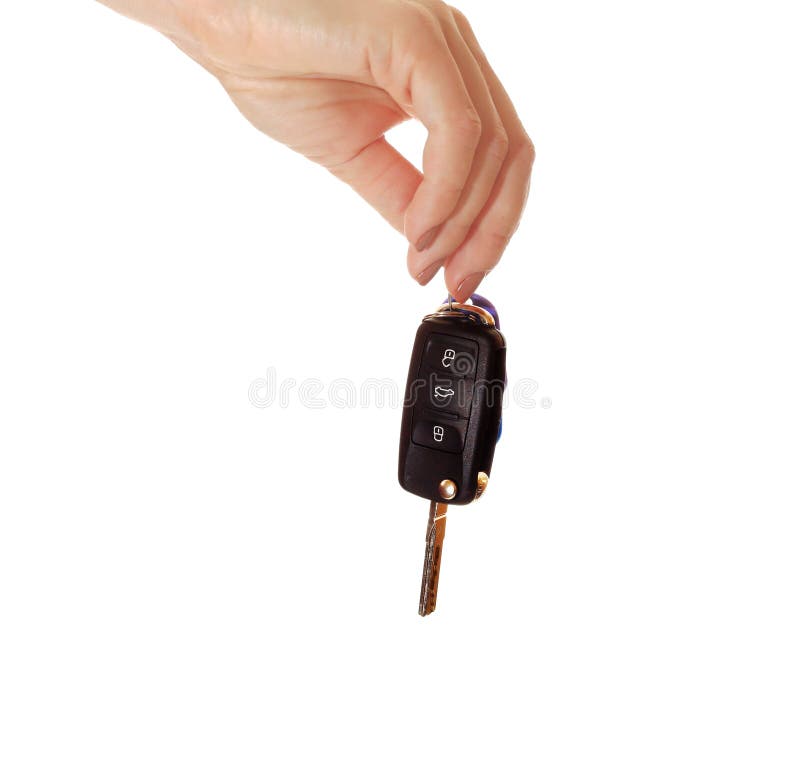 Car key in hand isolated on white background royalty free stock photography Car key in hand isolated on white background royalty free stock photography
