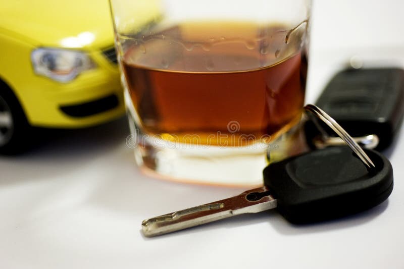 CAR KEY in a WINE GLASS stock image. Image of driver 12244365