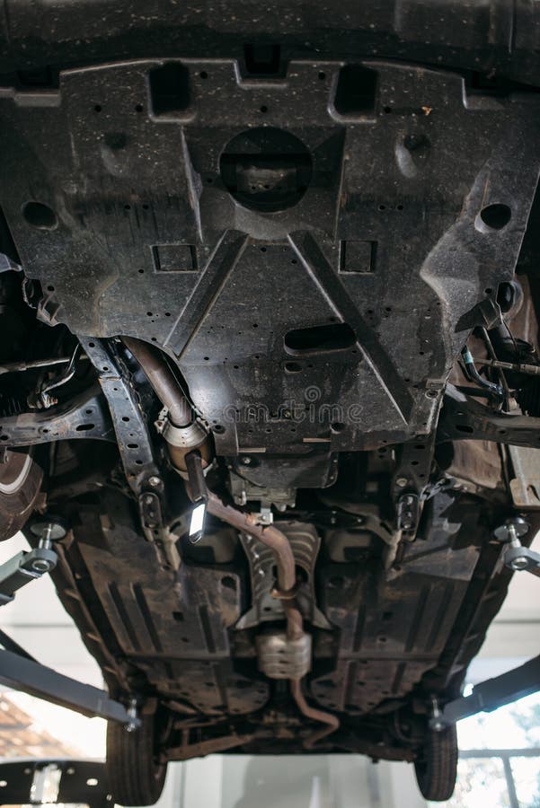 Car on the lift, bottom view, nobody, royalty free stock images Car on the lift, bottom view, nobody, royalty free stock images