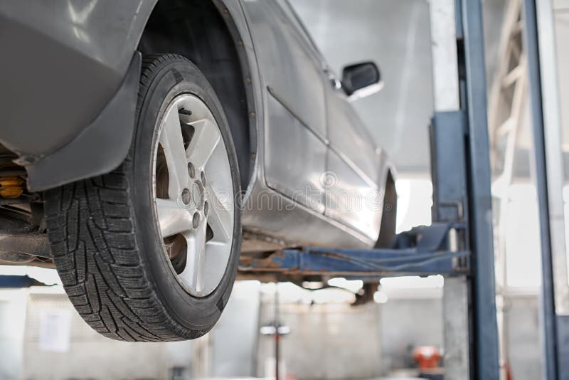 Car on Lift at Service Center, Closeup Stock Image Image of fixing