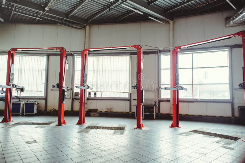 Car Lift in Car Service with Soft Focus, Car Maintenance Stock Image