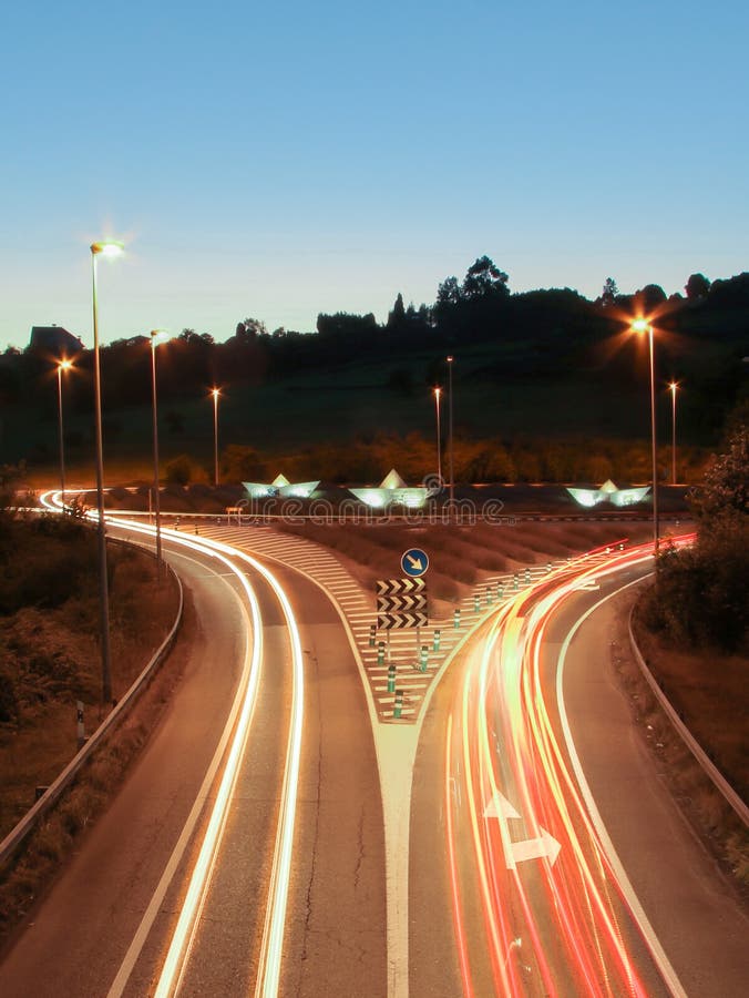 Car Light Trails on the Road and Paper Boats in a Roundabout Stock Image Image of ship