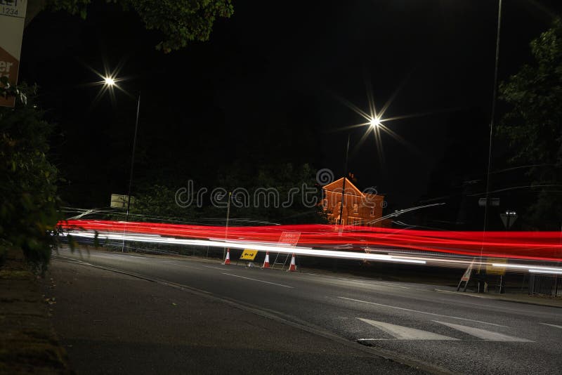 Of Car Lights on the Street at Night, Long Exposure Stock Photo Image