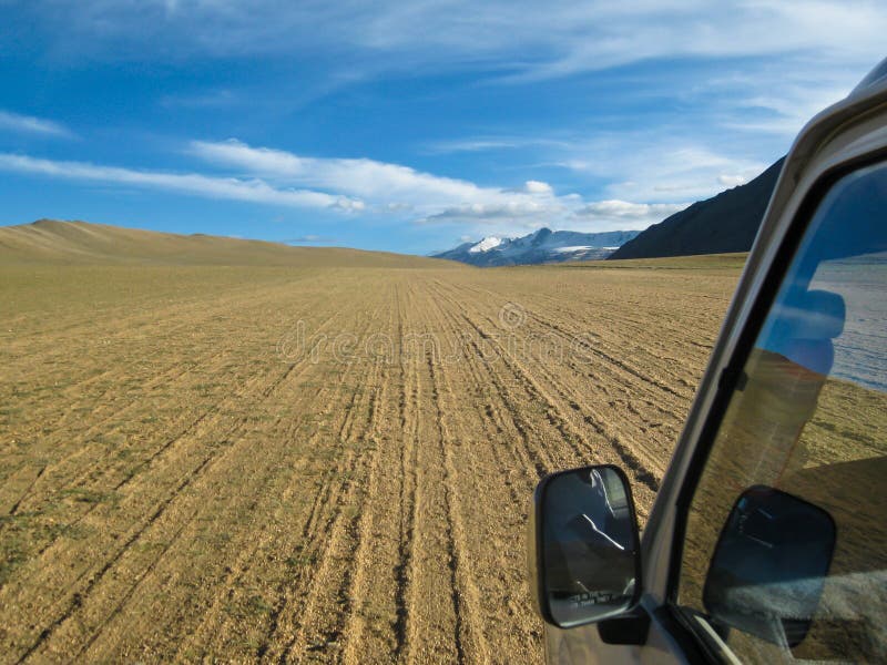 Car offroad on a sand dune in Ladakh