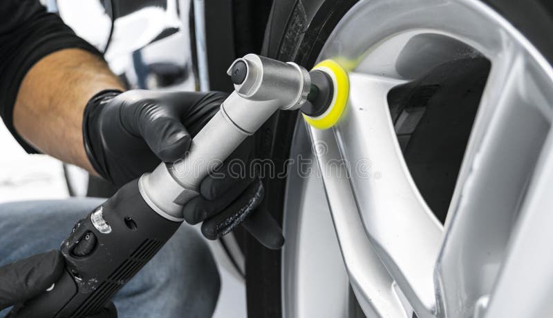 Car polish wax worker hands applying protective tape before polishing.  Buffing and polishing car. Car detailing. Man holds a polisher in the hand  and Stock Photo - Alamy