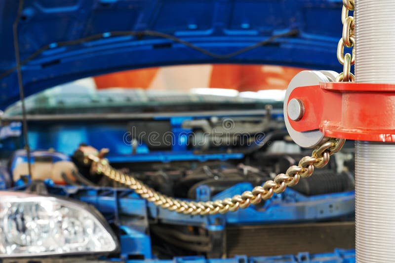 Car in Garage in Auto Mechanic Repair Service Work Shop with Special