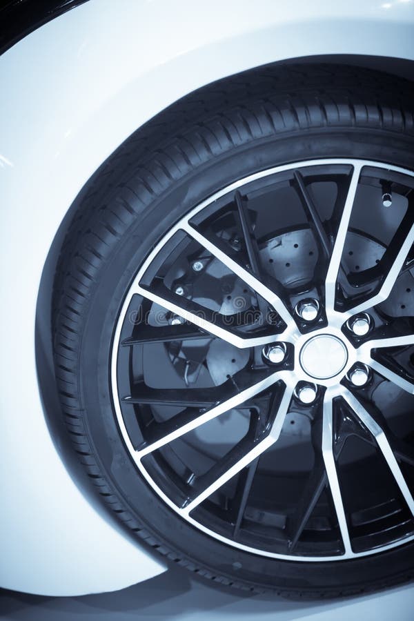 Car rim and brake caliper stock photo. Image of disc 107364408
