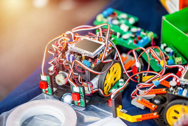 Car robot toy for kids education engineer by microcontroller circuit board SOC Microchip microcontroller stock image Car robot toy for kids education engineer by microcontroller circuit board SOC Microchip microcontroller stock image