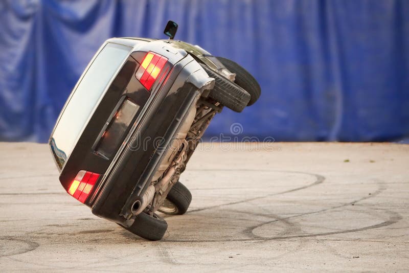Car Running on Two Wheels stock image. Image of concept 61380437