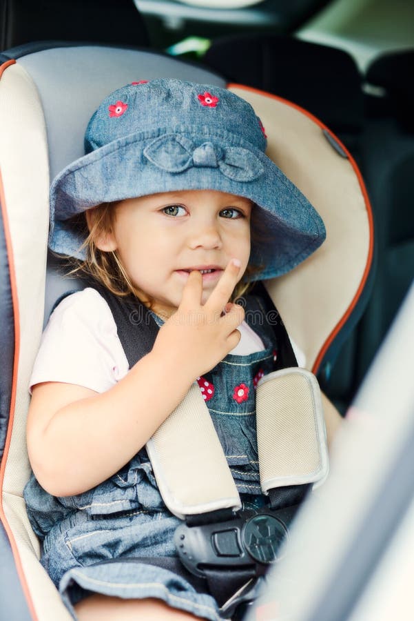 Kid in a safety car seat stock image. Image of boys, travel 5067057