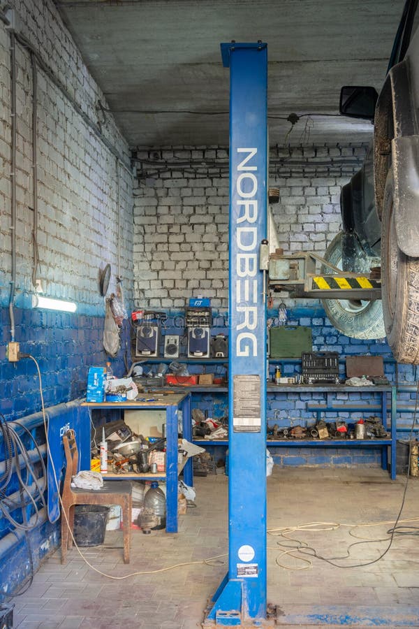 Interior of the Car, Car Repair, Service. Under the Bumper of the Car