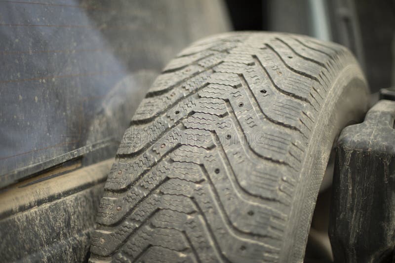 Car Spare Tire. Winter tires for car. Wheel on machine royalty free stock photography
