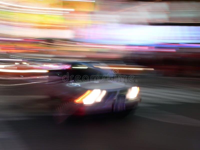 Download Car Speeds Through Times Square, New York City Stock Photo - Image of lighting, blur: 101552