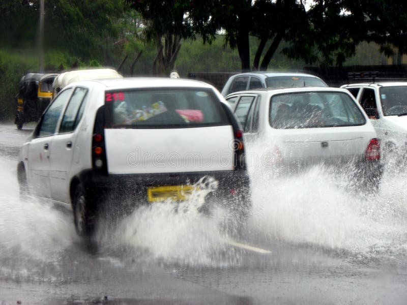 Water Splash With Car On Flooded Road After Rains Stock Photo Image