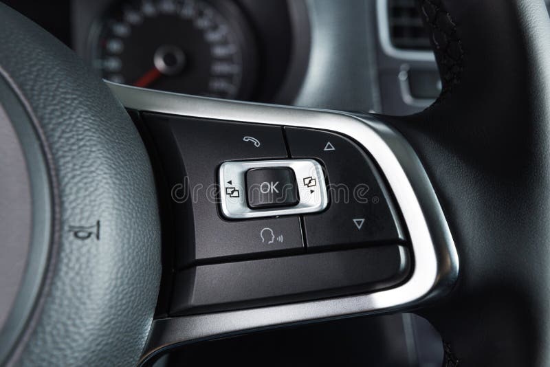Steering Wheel in a New Car. Steering Wheel with Control Buttons Stock