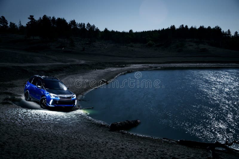 Car Subaru Forester stand at countryside off-road at night. Saratov, Russia - September 28, 2015: Car Subaru Forester stand at countryside off-road at night stock image Car Subaru Forester stand at countryside off-road at night. Saratov, Russia - September 28, 2015: Car Subaru Forester stand at countryside off-road at night stock image