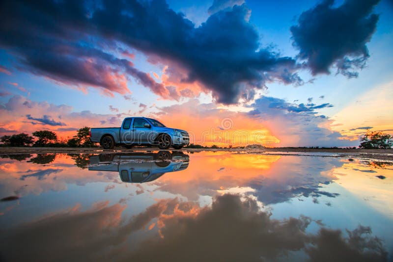 Car in the sunset stock image. Image of scape, flare 56467443