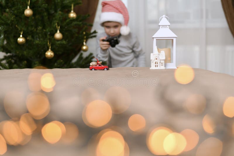The Car Takes the Presents Home. Child at the Christmas Tree, Leaning