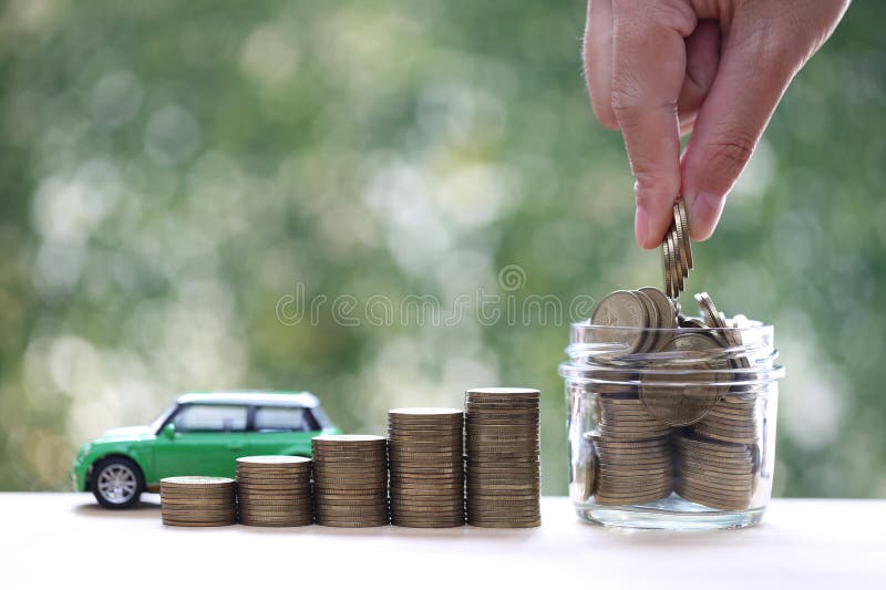 Car Tax Concept Stack Of Coins Money And Miniature Car Model On car-tax-concept-stack-of-coins-money-and-miniature-car-model-on