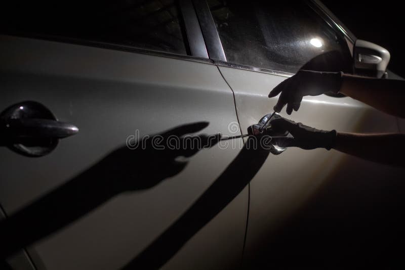 Car Thief Using A Tool To Break Into A Car Stock Photo Image Of Theft Insurance Car Thief Using A Tool To Break Into A Car Stock Photo Image Of Theft Insurance