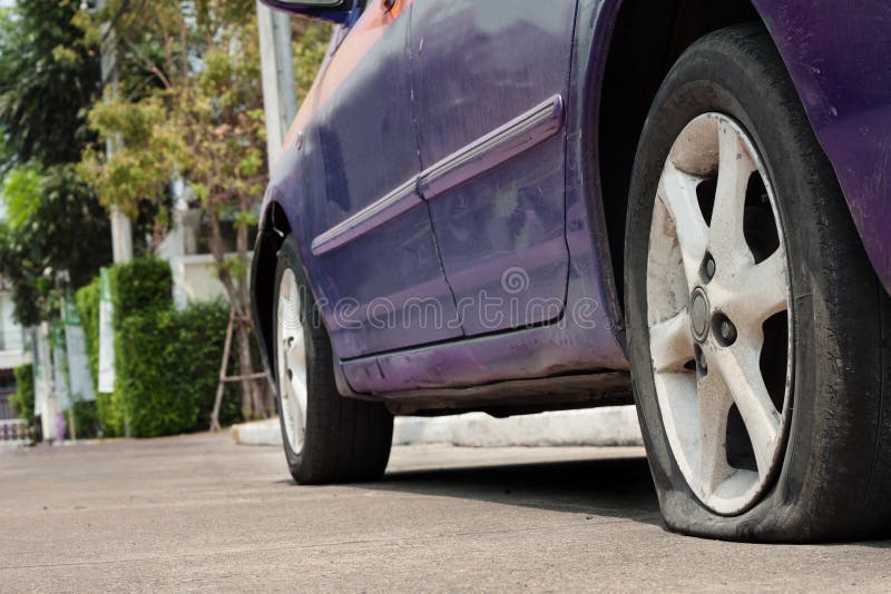 Car tire leak. stock photo. Image of junk, cars, junkyard 66409234