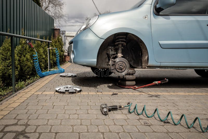 Car on Tire Replacement Service Editorial Photo Image of stand, auto
