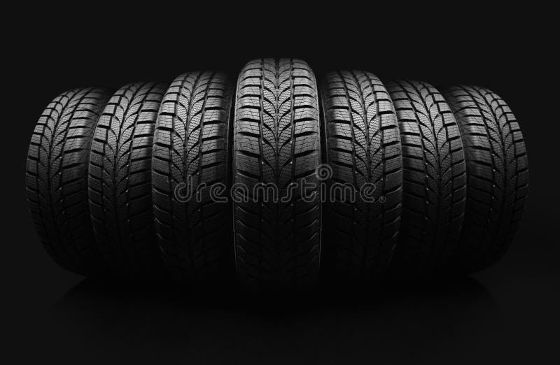 Many Tires in Piles and an Auto Mechanic Worker Carrying a Tire Stock Image Image of shot