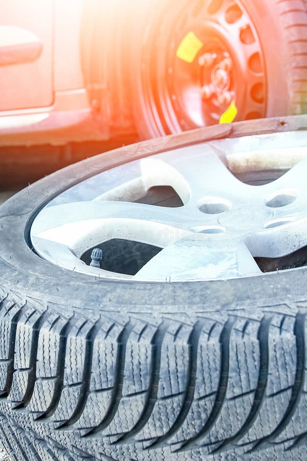 Car Tires and Wheels with Wheels for Auto Background Stock Photo