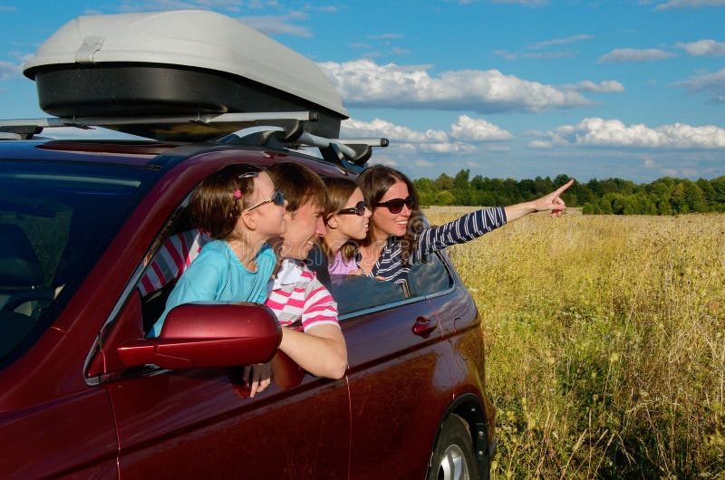 Car trip on family vacation, happy parents and kids travel and have fun, car insurance concept