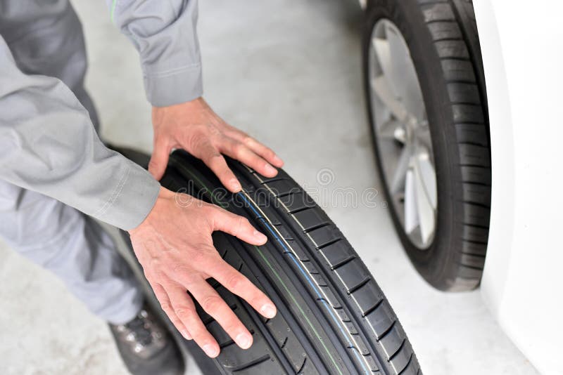 Tyre Change Wheel Balancing or Repair and Change Car Tire Stock Image