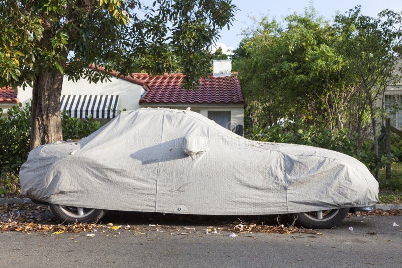 Car underneath a car cover stock photo. Image of outside 90046478