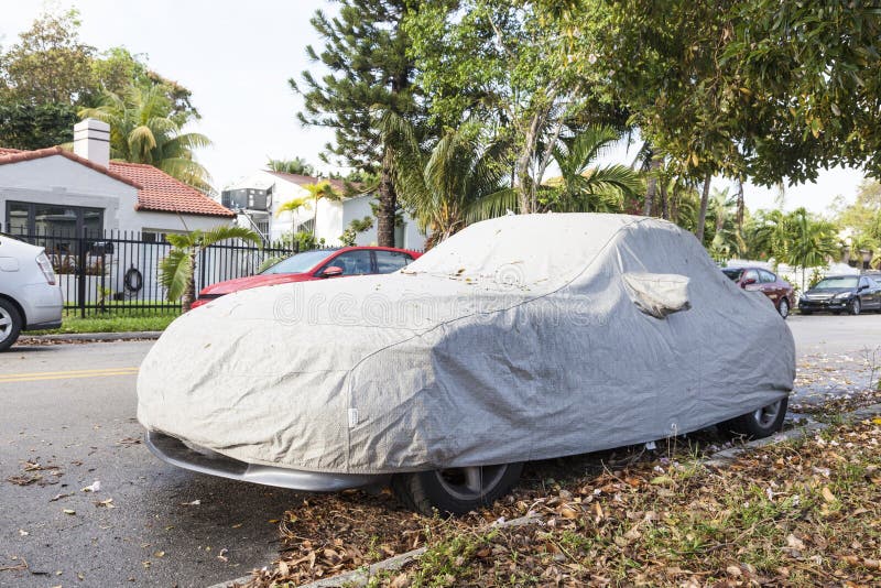 Car underneath a car cover stock photo. Image of outside 90046478