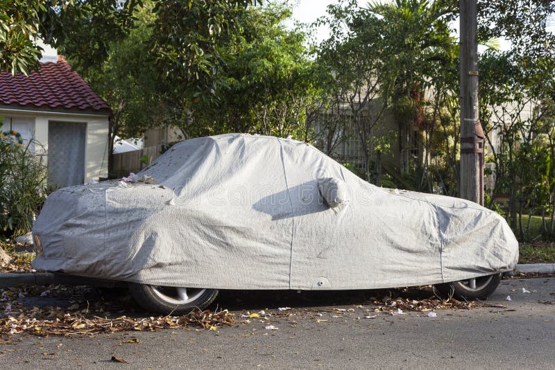 Car underneath a car cover stock photo. Image of outside 90046478