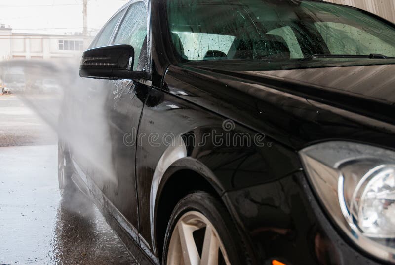 Car Wash. Cleaning Car Using High Pressure Water. Stock Image Image