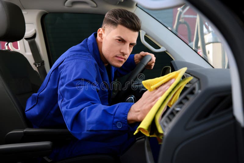 Car Wash Worker Cleaning Automobile Interior Stock Image Image of